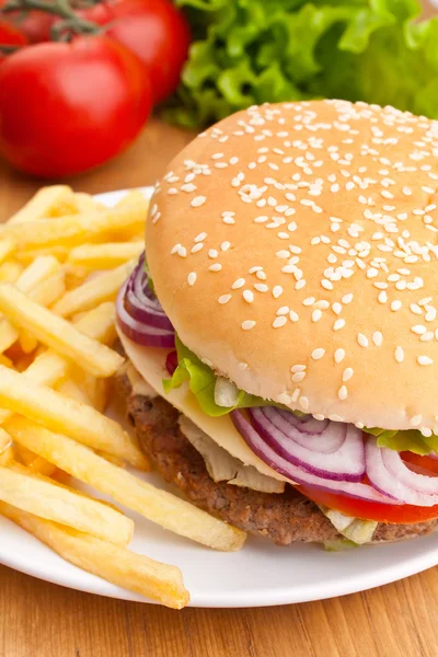 Big tasty cheeseburger — Stock Photo, Image