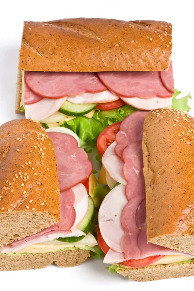 Three parts of long whole wheat baguette sandwich — Stock Photo, Image