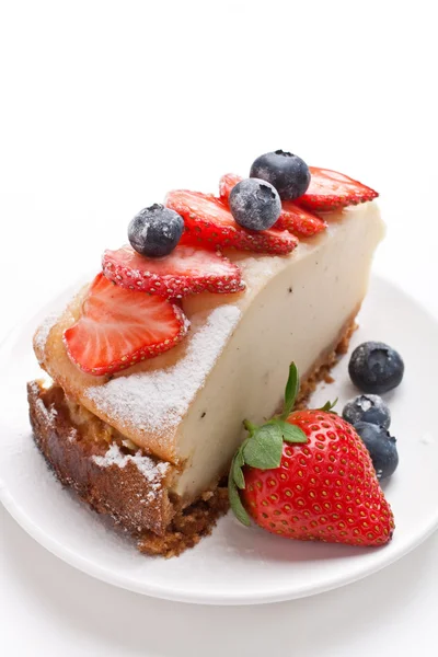 Stuk van smakelijke vanille cheesecake — Stockfoto