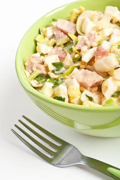 Egg salad in a green bowl with fork — Stock Photo, Image