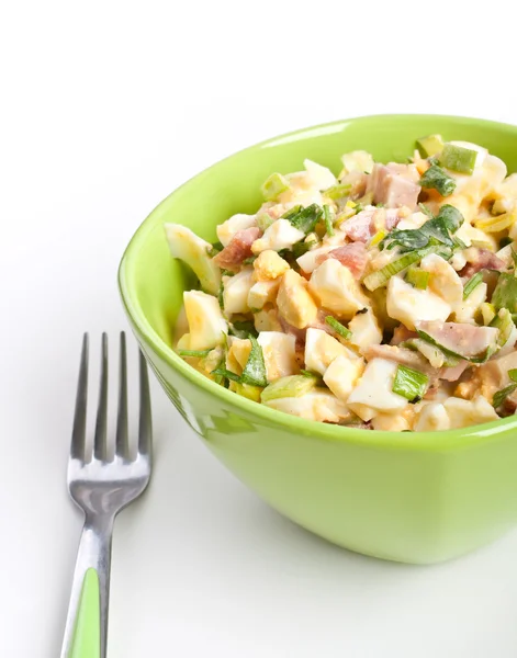 Egg salad in a green bowl with fork — Stock Photo, Image