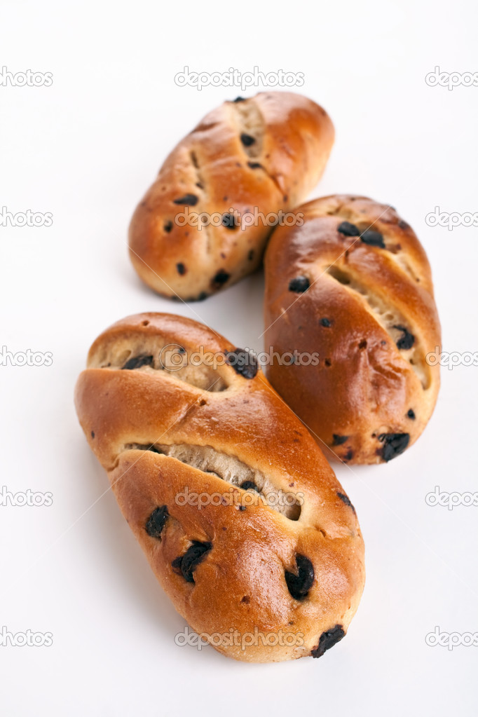 three buns with raisins