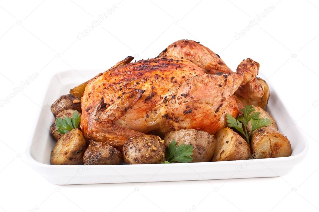Roasted chicken with roasted potatoes and parsley