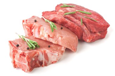 Raw pork chops and beef medallions clipart