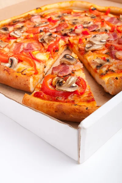 Ham and mushroom pizza in a pizza-box — Stock Photo, Image