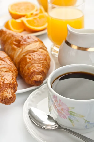 Breakfast with coffee and croissants — Stock Photo, Image