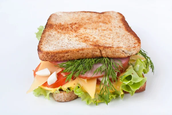 Meat, lettuce and cheese sandwiches on toasted bread — Stock Photo, Image