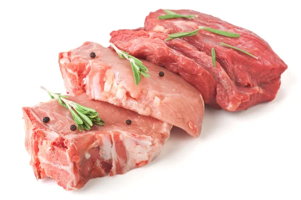 Raw pork chops and beef medallions — Stock Photo, Image