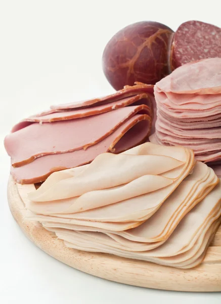 Big group of thinly sliced meat — Stock Photo, Image