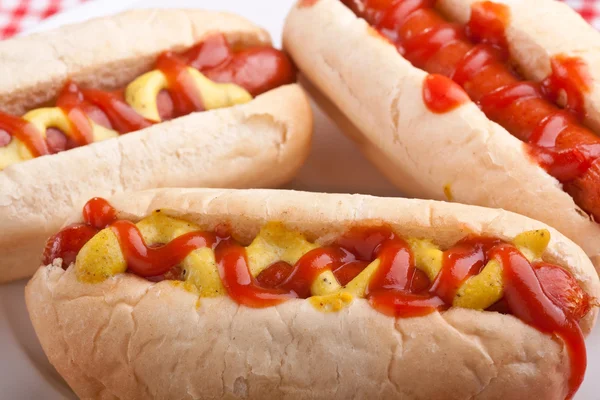 Three classic hot dogs — Stock Photo, Image