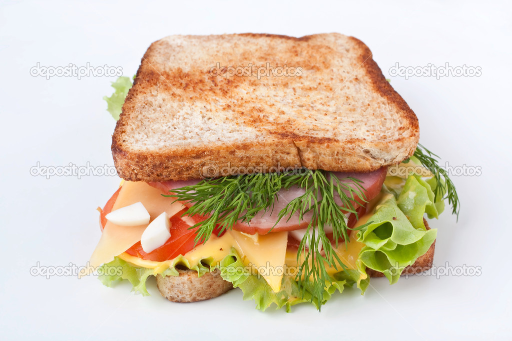 Meat, lettuce and cheese sandwiches on toasted bread