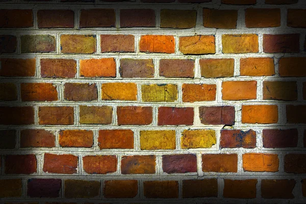 Verwitterte gefärbte alte Backsteinmauer Hintergrund. — Stockfoto