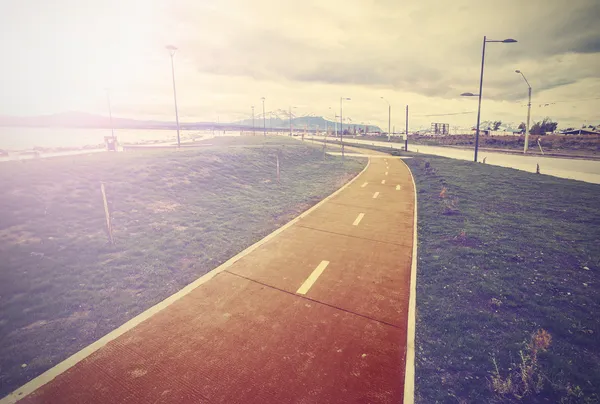 Foto vintage da ciclovia ao longo do porto, Puerto Natales , — Fotografia de Stock