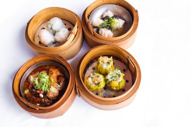 Various dim sum in bamboo steamed bowl clipart