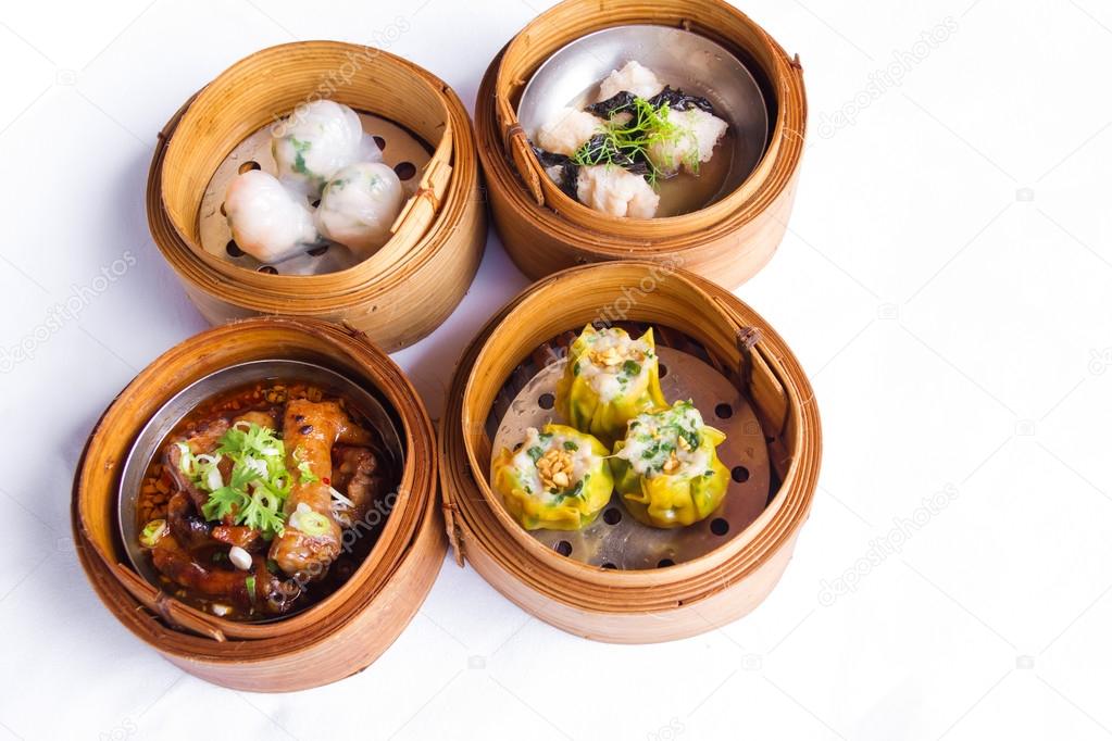 Various dim sum in bamboo steamed bowl