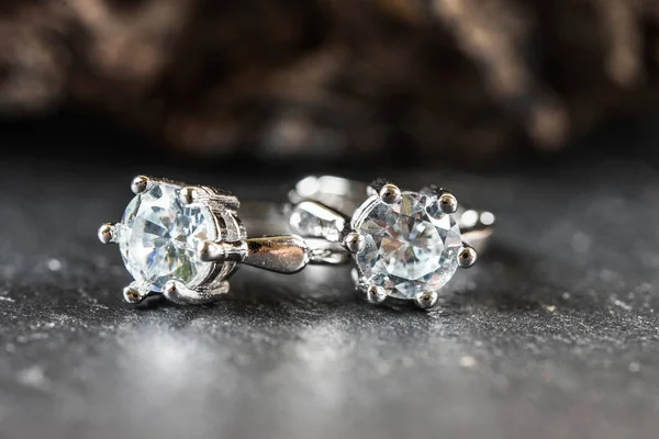 beautiful diamond earrings. Close up of white diamond earrings.