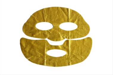Beyaz arka planda altın rengi maske