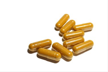 Beyaz arkaplan üzerindeki kapsüller