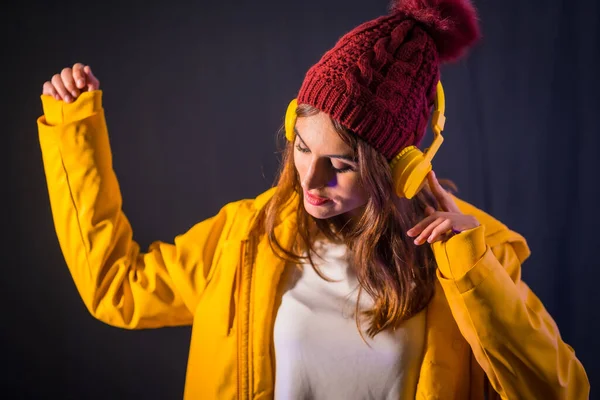 Portrait Young Brunette Caucasian Headphones Yellow Jacket Wool Hat Black — Stock Photo, Image