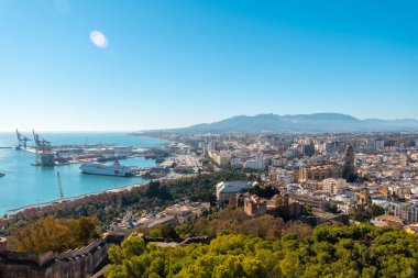 Views of the city, the town hall and its gardens and the port from the Gibralfaro Castle in the city of Malaga, Andalusia. Spain