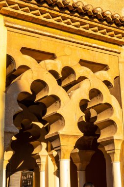 Detail of precious Arabic windows and doors inside the Alcazaba in the city of Malaga, Andalusia. Spain. Medieval fortress in arabic style