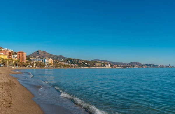 Beautiful Malagueta beach and its palm trees in the city of Malaga, Andalusia. Spain