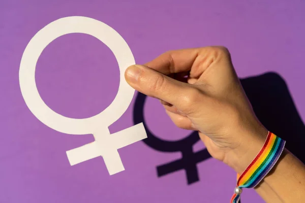 Hand Holding Female Symbol Drawing Purple Background Fighting Favor Women — Stock Photo, Image