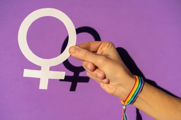 Hand Holding Female Symbol Drawing Purple Background Fighting Favor Women — Stock Photo, Image