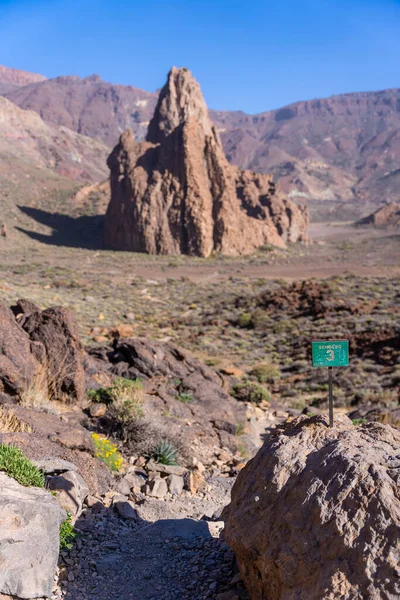 Signal number three of the trail in the Cathedral between Roques de Gracia and Roque Cinchado in the natural area of Teide in Tenerife, Canary Islands