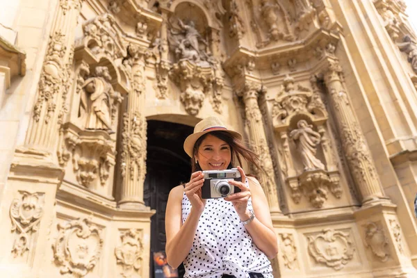 Smiling Female Tourist Hat Visiting Church Taking Photos Camera Enjoying — Zdjęcie stockowe