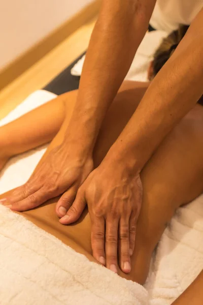 Hands Masseur Performing Massage Back Client Table — Fotografia de Stock