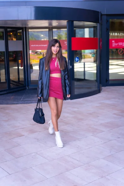 Portrait Caucasian Girl Red Dress Walking Out Revolving Door Shopping — Stock Photo, Image