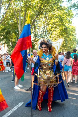 Madrid, Spain: July 9, 2022: A trans queen taking photos with the public at the gay pride party, lgbt in Madrid