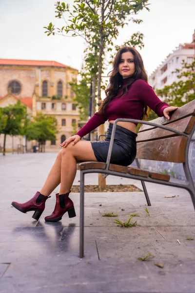 Brunette Woman Leather Skirt Sitting City Church Background Autumn — Photo