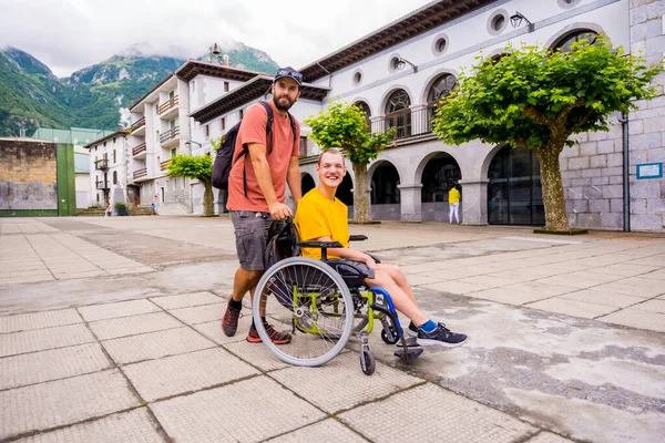 Disabled Person Wheelchair Walking Town Square Friend — Stock Fotó