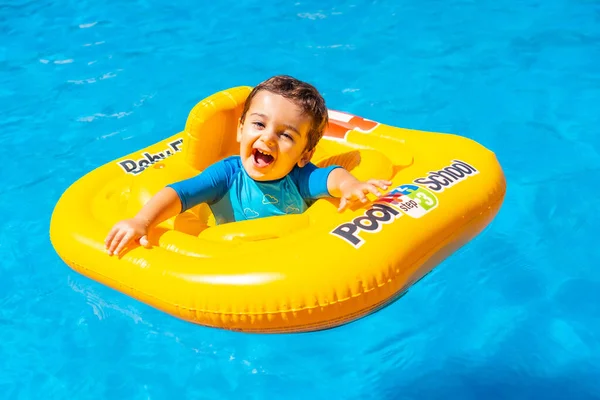 One Year Old Boy Smiling Yellow Float Swimming Pool Playing — Fotografia de Stock