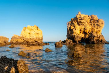 Beautiful beach in summer, vacation at Praia dos Arrifes, Algarve beach, Albufeira. Portugal