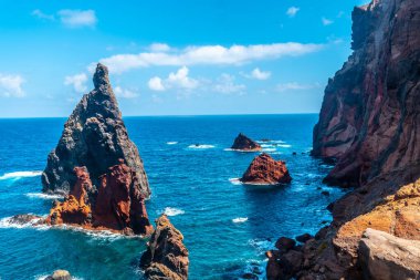 View from the viewpoint of the colorful rock formations at Ponta de Sao Lourenco, Madeira coast. Portugal