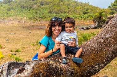 Fanal forest in Madeira, thousand-year-old laurel trees, portrait of a mother with her son