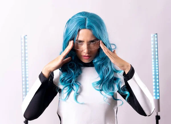 Futuristic, portrait of a young woman with blue hair, wearing augmented reality glasses