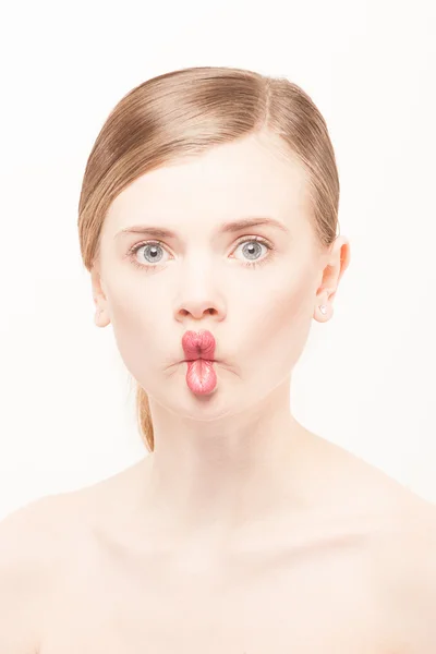 Portrait of beautiful young woman with clean face. High key shot — Stock Photo, Image