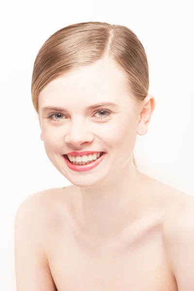 Portret van een mooie vrouw op een witte achtergrond — Stockfoto