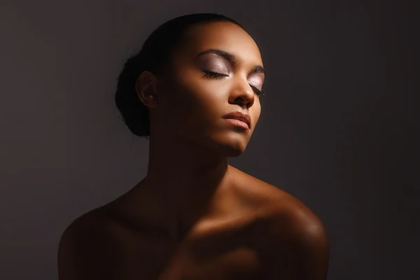 Black naked woman Stock Photo by ©kazzakova 103486372