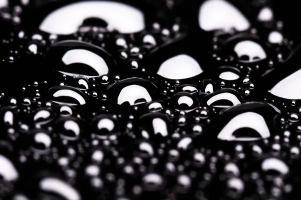 Gotas de água em preto — Fotografia de Stock