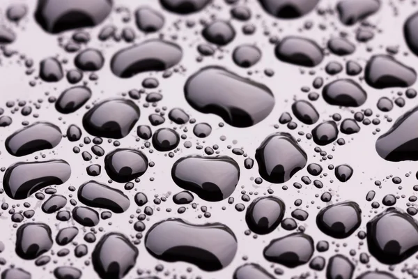 Gotas de agua en negro — Foto de Stock