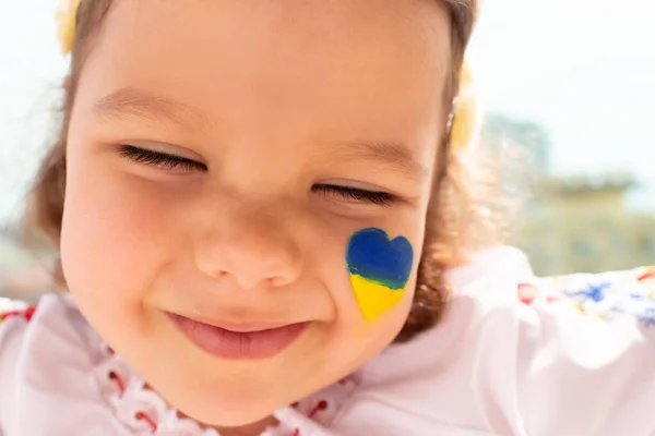 Little Happy Girl Blue Yellow Heart Her Cheek Little Ukrainian — Stock Photo, Image