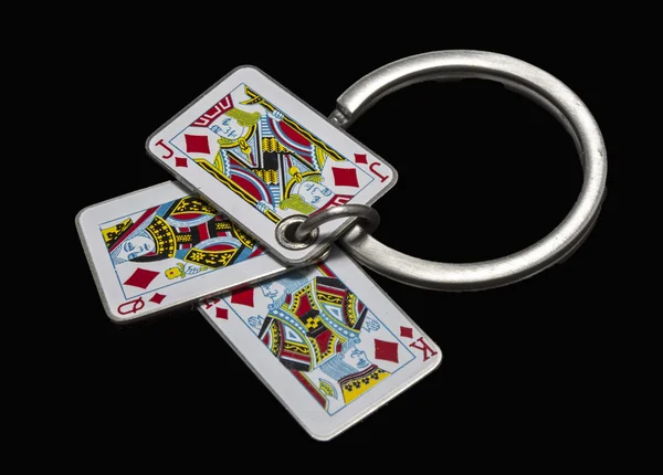 Poker key chain isolated on black — Stock Photo, Image