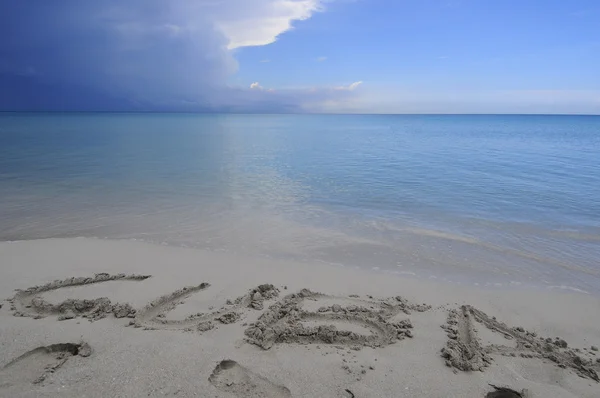 Cuba plage, lettres sur le sable — Photo