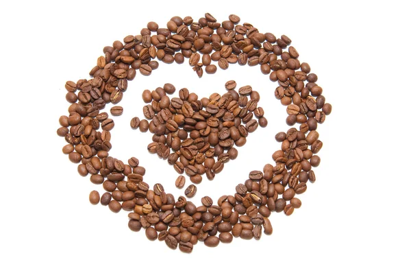 Coração feito por grãos de café — Fotografia de Stock