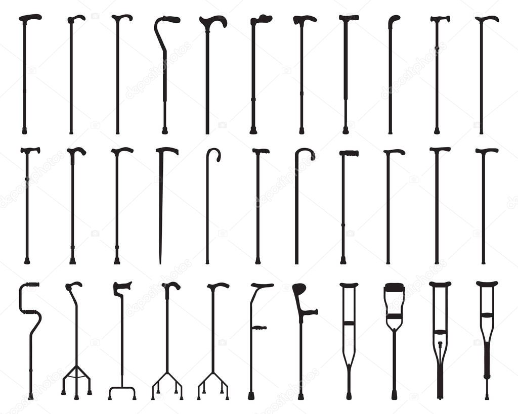 Black silhouettes of sticks and crutches  on a white background